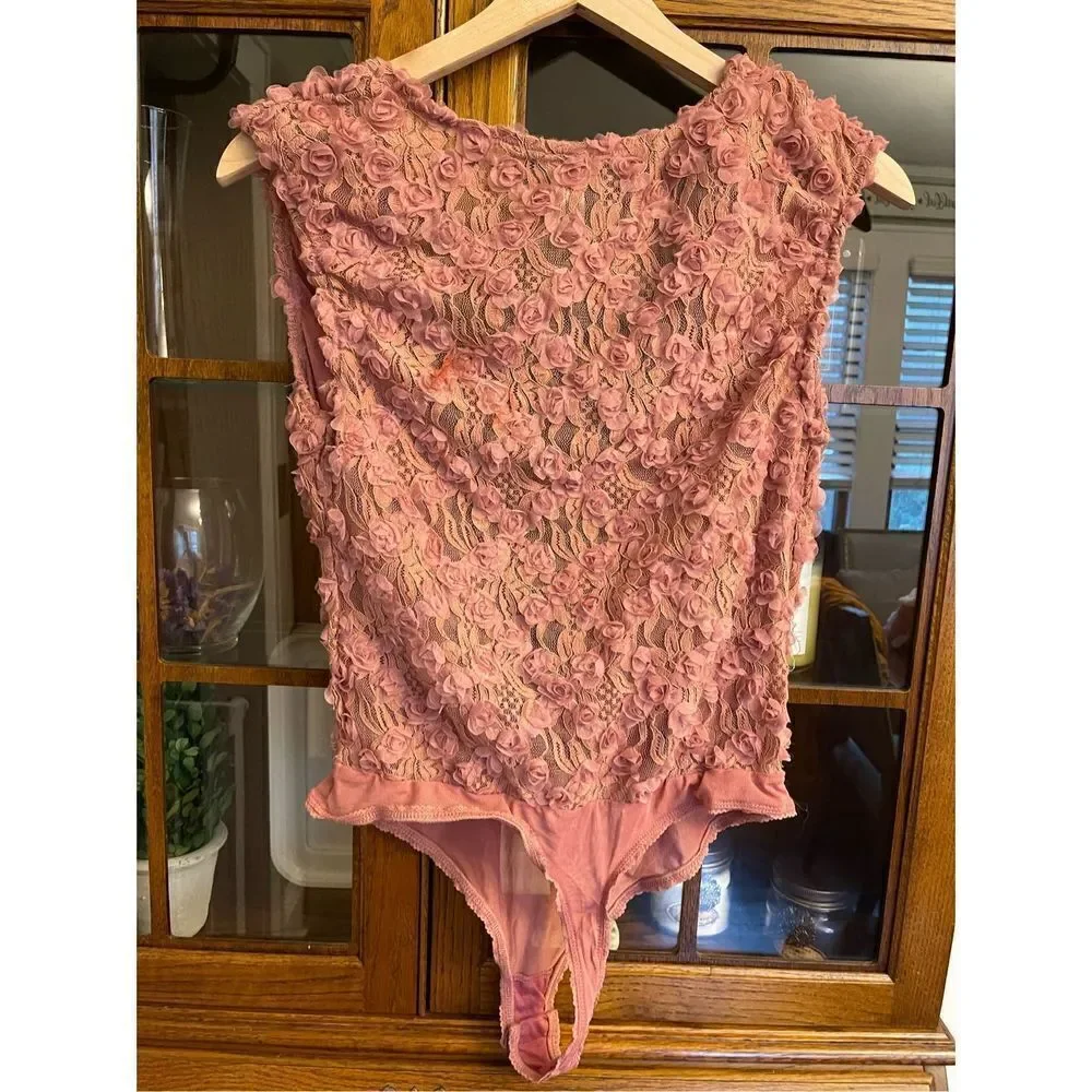 Free people - 2 hot 2 handle pink bodysuit size Medium